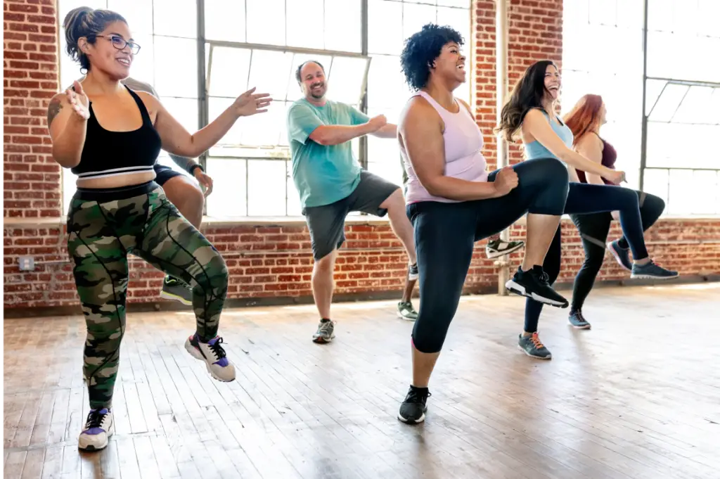 Group fitness class in a bright studio