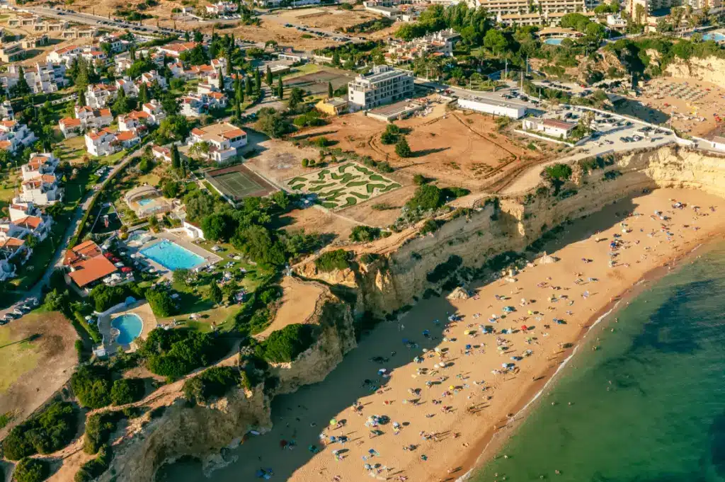 Aerial view of beach and seaside village.