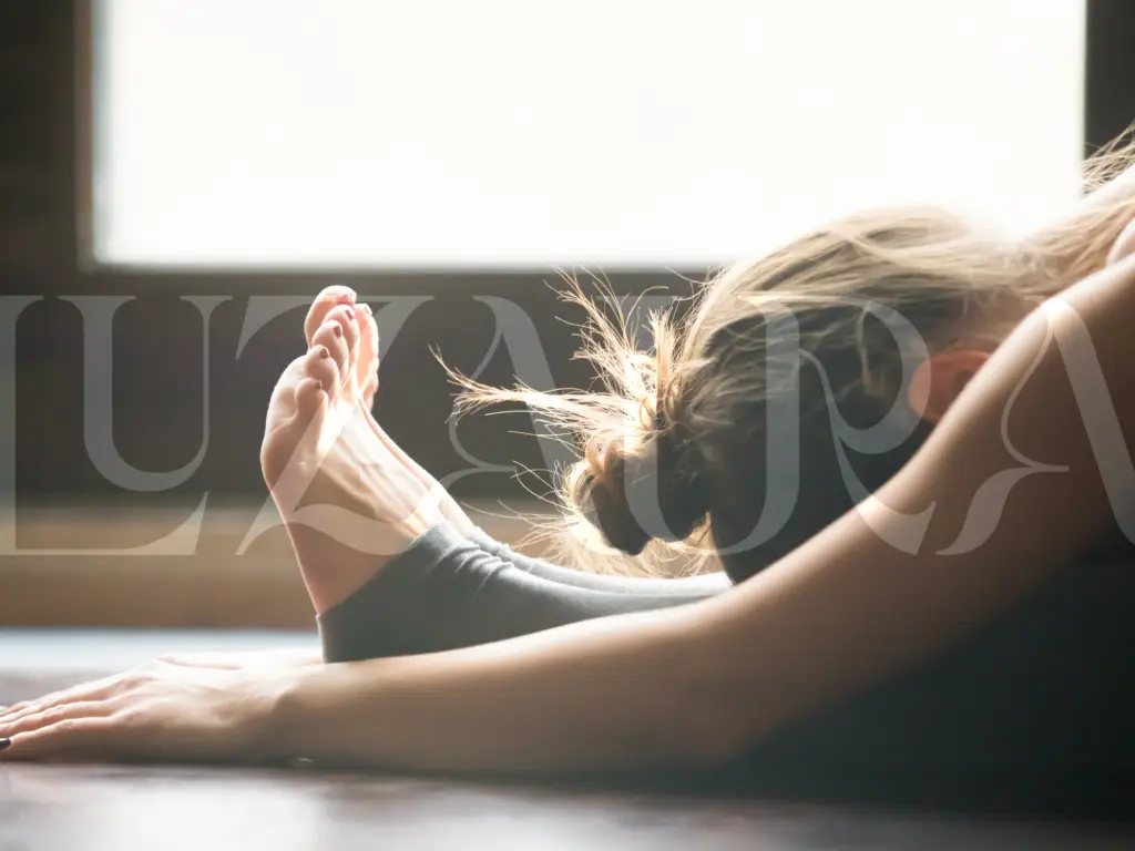 Person resting in a yin yoga pose.